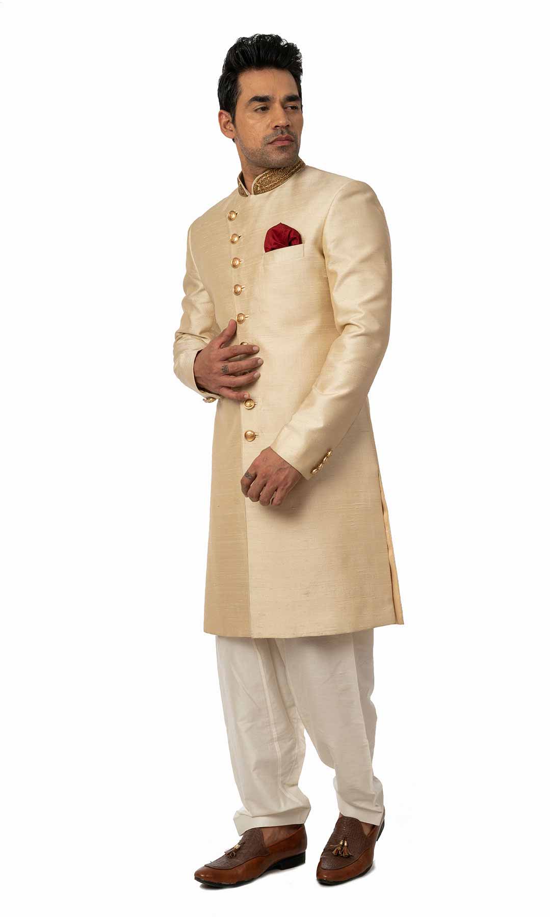 Cream Coloured Angrakha Style Sherwani With Zari Embroidered Collar - Viraaya By Ushnakmals